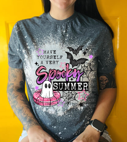 Cute ghost pool float graphic shirt with pink, black, and white summerween design details. Dark Heather Grey Bleached